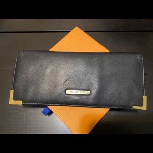 Michael Kors wallet/clutch black and gold hardware